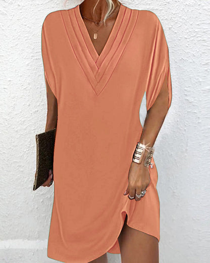 Robe élégante à manches fendues de couleur unie